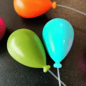 Koelkastmagneetjes Ballon 4 Ballon magneetjes van dichtbij in mooie kleuren groen, aqua blauw en oranje