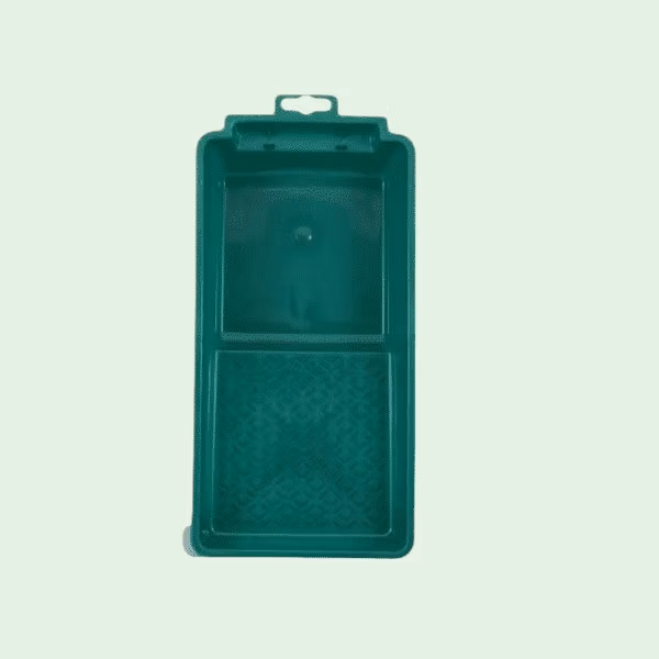 Groen verfbakje om verf te rollen