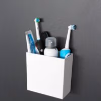 Wit magnetische bakje Uranos op zwart magneetbord