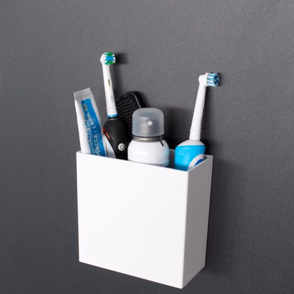 Wit magnetische bakje Uranos op zwart magneetbord