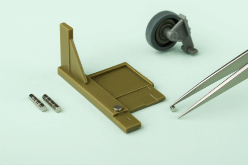 Fotorealistische uitgelichte afbeelding van kleine neodymium modelbouwmagneten. Perfect voor miniatuurprojecten, schaalmodellen en precisietoepassingen. Past in de huisstijl van MagneetjesWinkel.nl met zachte mintgroene achtergrond.